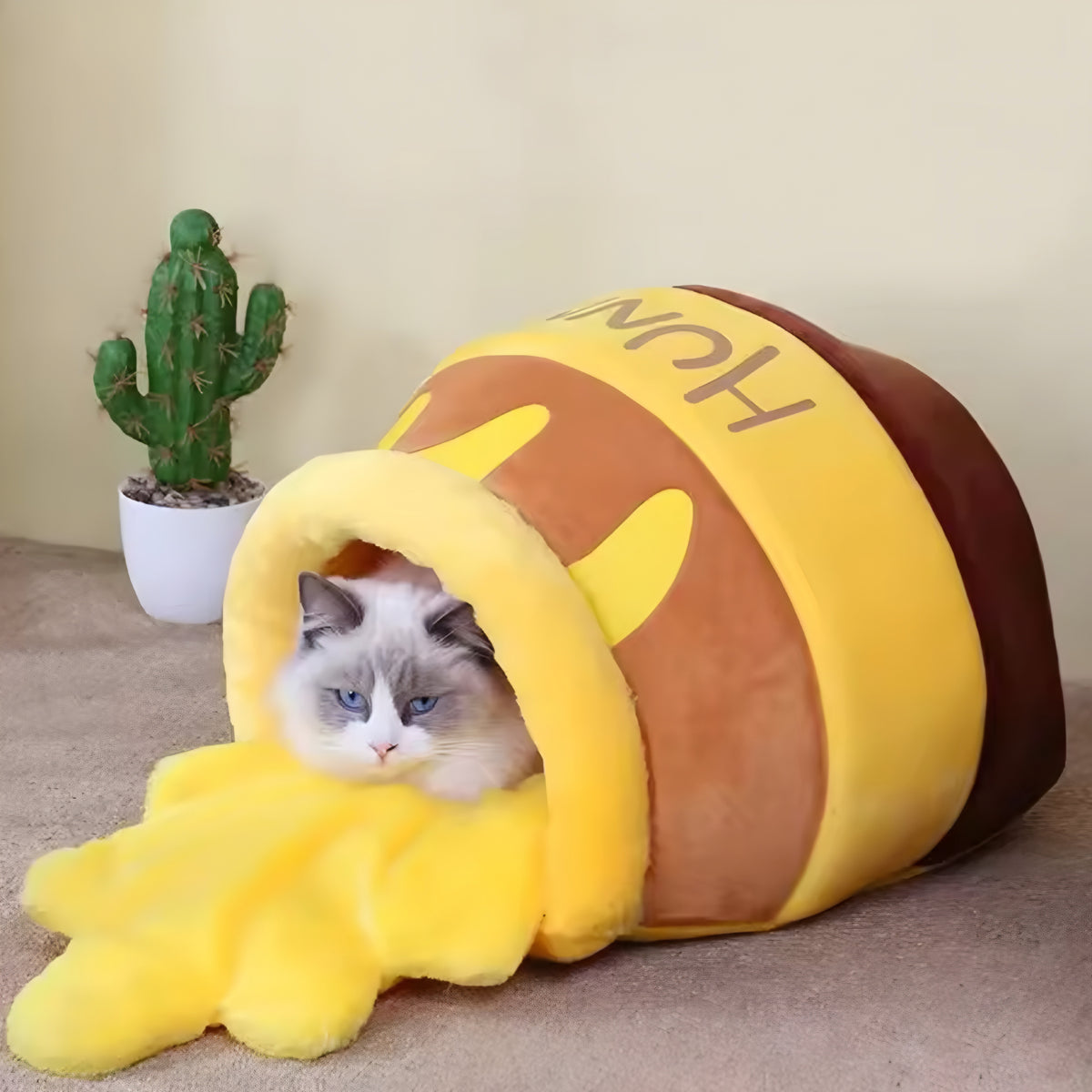 Kuscheliges Katzenbett im Honigtopf-Design